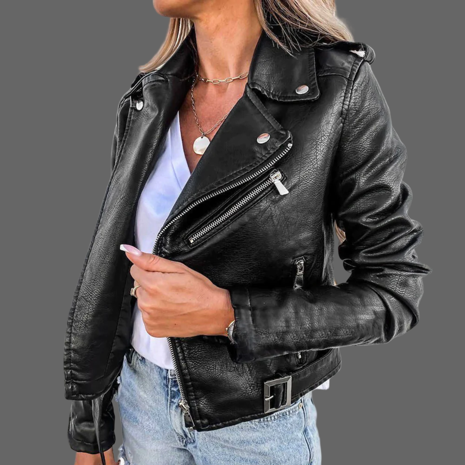 Dames leren jas gemaakt van premium leer, met een stijlvol design inclusief taille accentuerende riem. Verkrijgbaar in trendy rood en zwart, en geschikt voor diverse gelegenheden. Maattabel beschikbaar voor de juiste pasvorm.