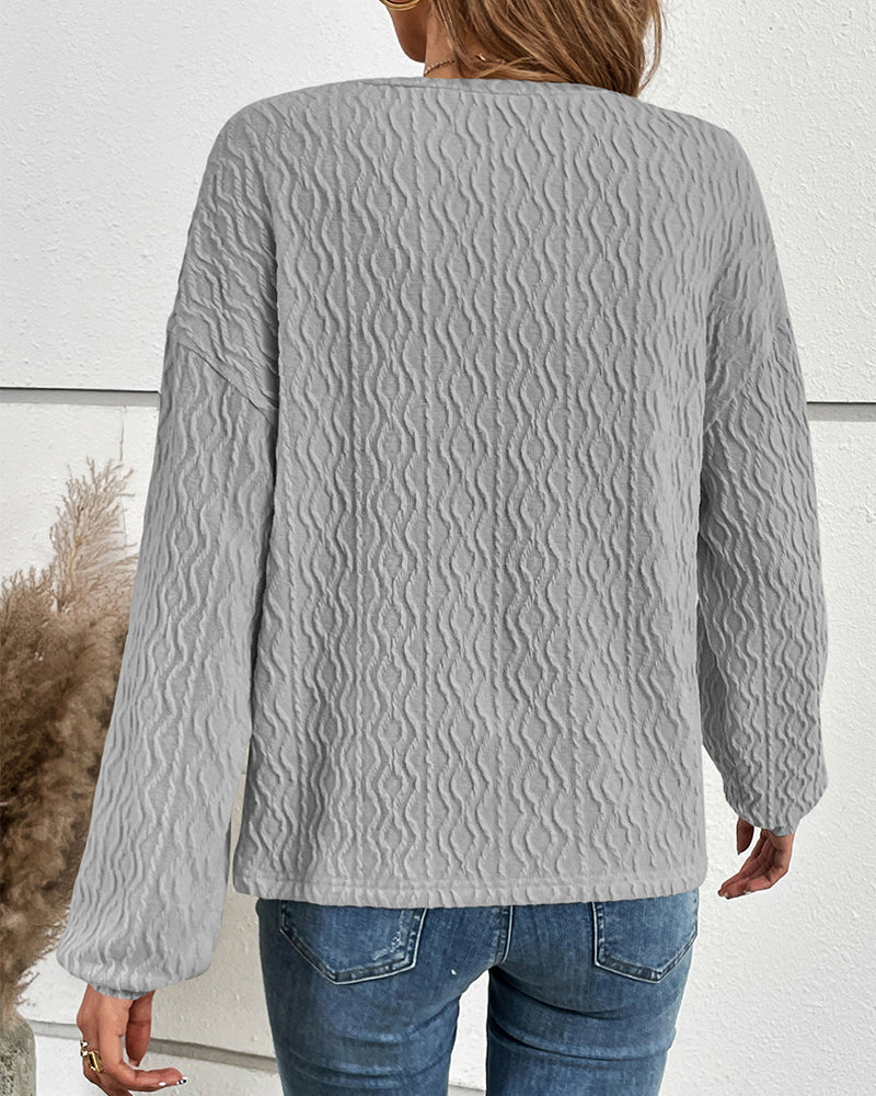 Effen topje met knopen in de kleur Grijs voor dames in stijl ideaal voor de herfst.